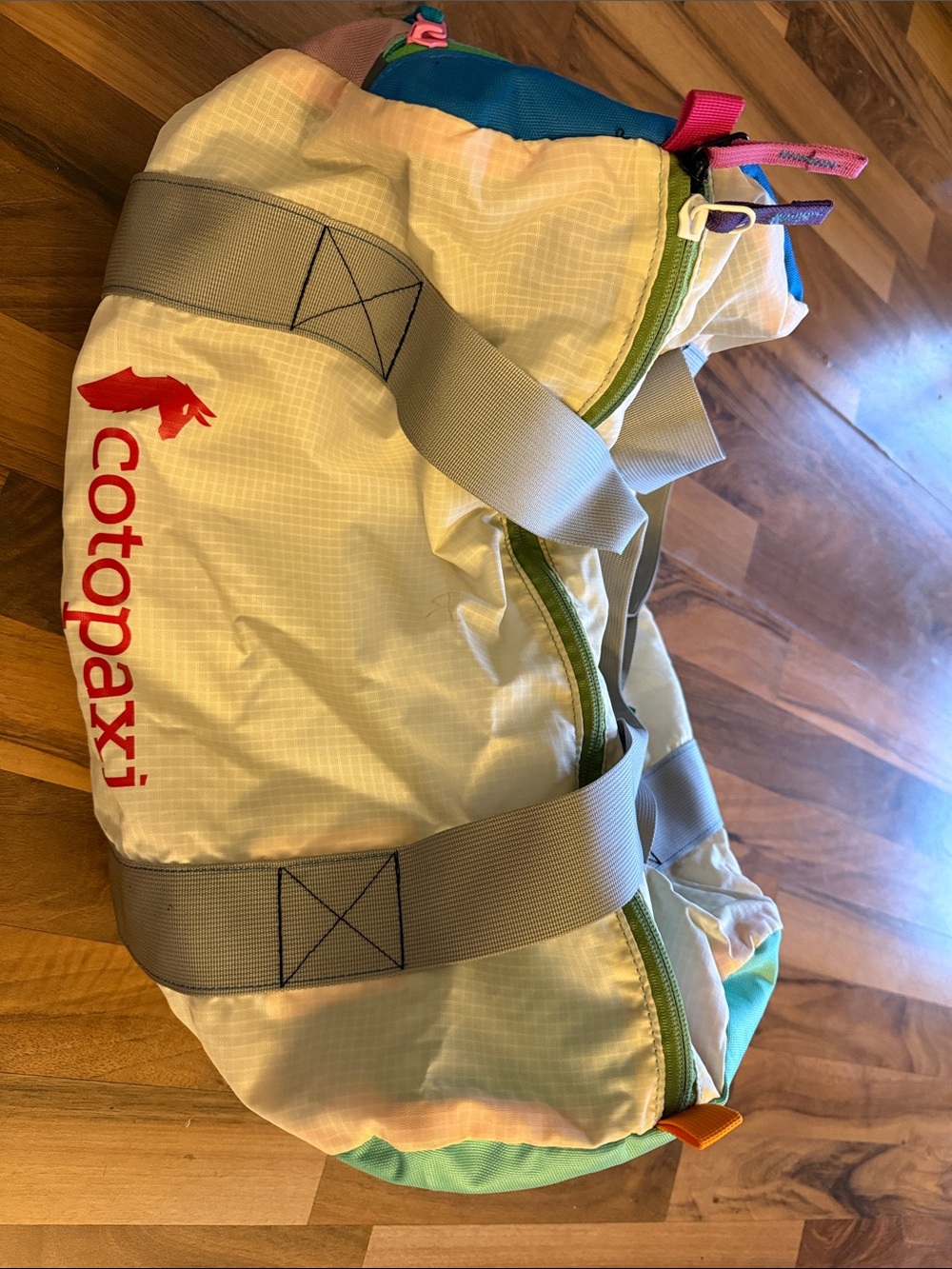 Cotopaxi  32 l Cream Duffel with Teal & Pink Accents
